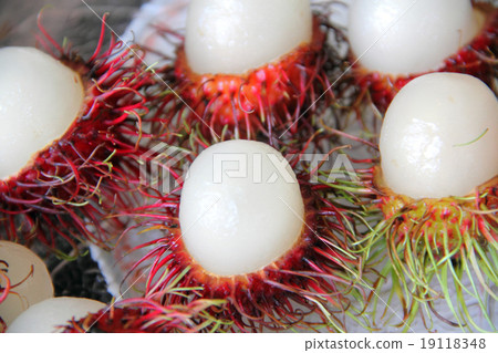 red rambutan in plate 19118348