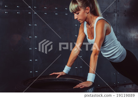 Sportswoman. Fit sporty athlete woman doing push 19119889