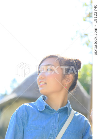 Profile of a young woman, Park walk, Back blur 19122740