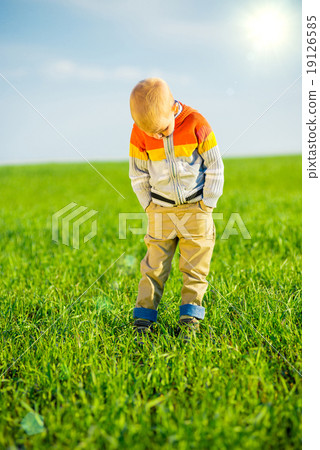 Portrait of happy joyful beautiful little boy outdoor at countryside. Pointing concept. Portrait of happy joyful beautiful little boy outdoor at countryside. Pointing concept. 19126585
