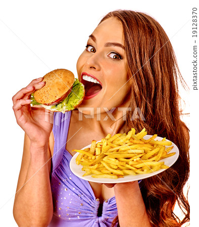 Girl eating big sandwich. 19128370