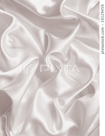 Smooth elegant golden silk or satin texture Smooth elegant golden silk or satin texture 19129459
