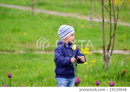 Two year old girl on walk in the park Two year old girl on walk in the park 19130646