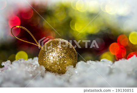 Gold Christmas Ball on defocused lights background 19130851