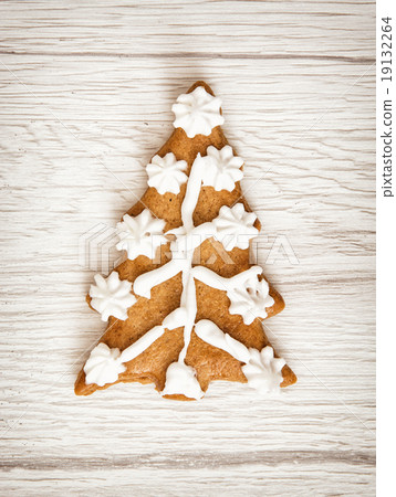 Decorated christmas tree shaped gingerbread cookie Decorated christmas tree shaped gingerbread cookie 19132264