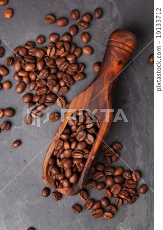 Coffee beans on stone table 19133712