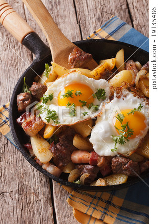 Tyrolean fried potatoes with meat, bacon and eggs 19135486