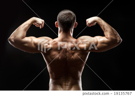 Man back shows big muscles. 19135767
