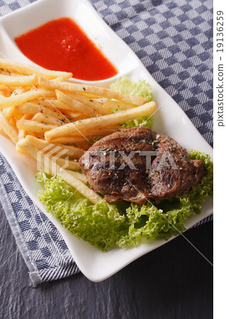 Grilled beefsteak with french fries and lettuce Grilled beefsteak with french fries and lettuce 19136259