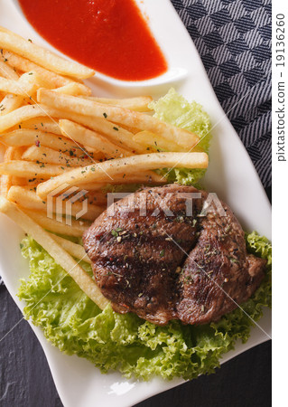 Grilled beefsteak on a plate 19136260