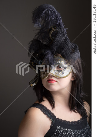 portrait of a teen girl in a venetian mask 19138149