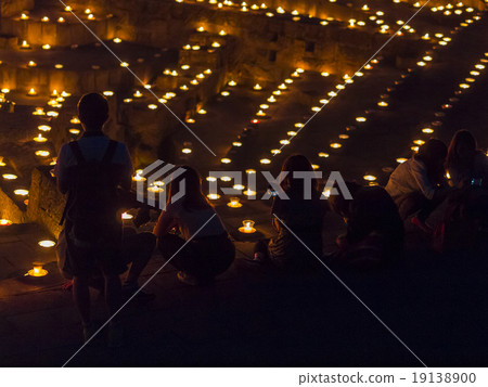 Shadows of people looking at the ocean of the candle Shadows of people looking at the ocean of the candle 19138900