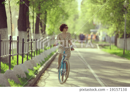 girl on a bicycle spring morning girl on a bicycle spring morning 19157138
