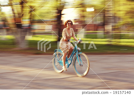girl on a bicycle spring morning girl on a bicycle spring morning 19157140