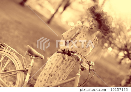 Vintage sepia portrait of a girl hipster concept Vintage sepia portrait of a girl hipster concept 19157153