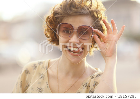 Funny portrait of a beautiful sexy girl Summer Funny portrait of a beautiful sexy girl Summer 19157283