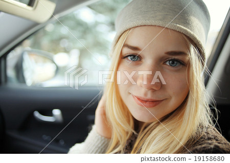 beautiful young blond teen in the car 19158680