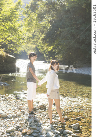 outdoorsy, outing to the riverside, playing in a river 19162501