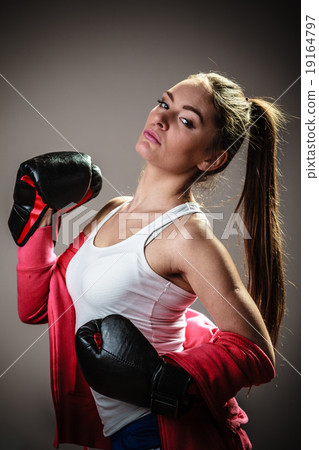Sport boxer woman in black gloves boxing Sport boxer woman in black gloves boxing 19164797