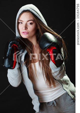 Sport boxer woman in black gloves boxing Sport boxer woman in black gloves boxing 19164798