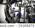 Gym interior close up, machinery and weightlifting 19168474