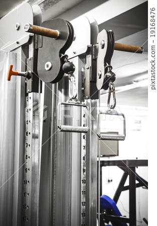 Gym interior close up, machinery and weightlifting 19168476