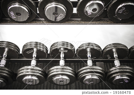 Gym interior close up, machinery and weightlifting 19168478