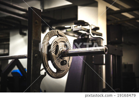 Gym interior close up, machinery and weightlifting 19168479