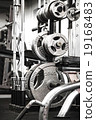 Gym interior close up, machinery and weightlifting 19168483