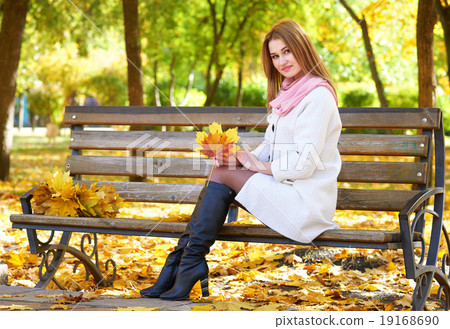 girl portrait with leaves in autumn city park girl portrait with leaves in autumn city park 19168690