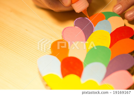 Colorful toys made of cardboard on a wooden table. Colorful toys made of cardboard on a wooden table. 19169167