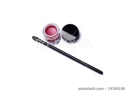 Red lip gloss in jar with makeup brush 19169186