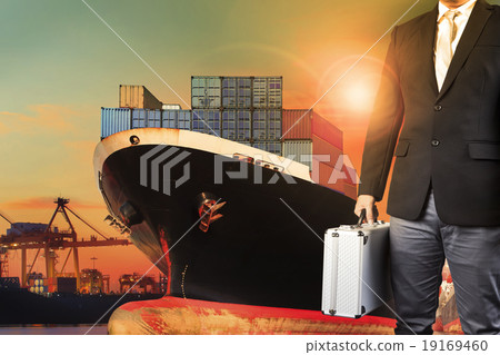 business man standing with import export shipping business man standing with import export shipping 19169460