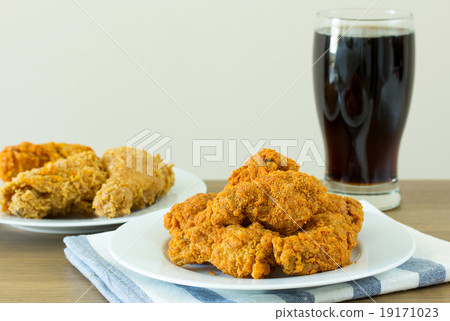 fried chicken with cola on dining table 19171023