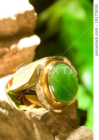 Jade gold ring with beautiful background Jade gold ring with beautiful background 19175639