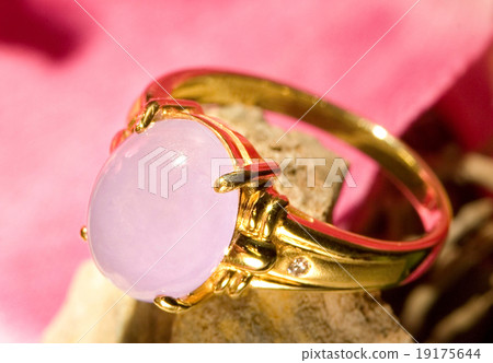 Pink jade gold ring with beautiful background 19175644