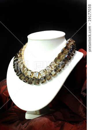 Beautiful Topaz necklace on dark background Beautiful Topaz necklace on dark background 19177038