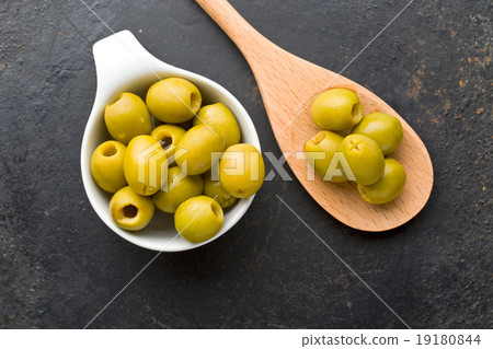 pitted green olives in bowl pitted green olives in bowl 19180844
