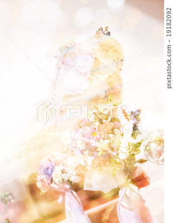 wedding cake on soft flower background wedding cake on soft flower background 19182092
