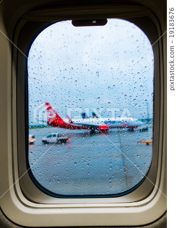 View of the aircraft through the window  19183676