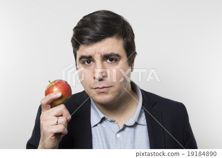 studio shot of successful person and an apple 19184890