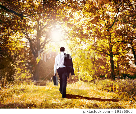 Businessman Walking Outdoors 19186863