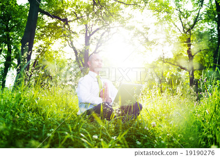 Green Businessman Meditation Technology Peaceful Concept 19190276