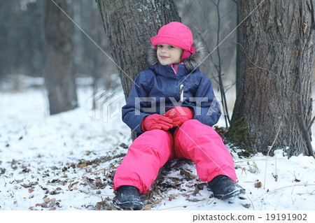child on a winter walk in the park 19191902