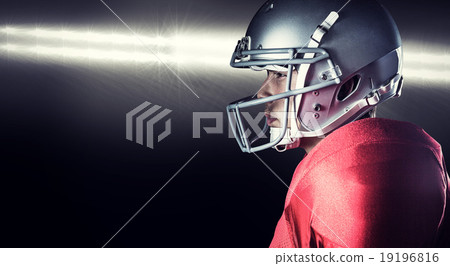 Composite image of side view of serious sportsman standing 19196816