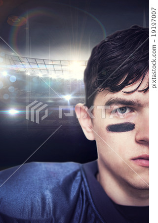 Composite image of american football player looking at the camer Composite image of american football player looking at the camer 19197007