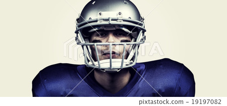 Composite image of portrait of determined american football play Composite image of portrait of determined american football play 19197082