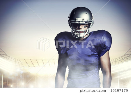 Composite image of american football player standing 19197179