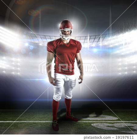Composite image of american football player looking at camera 19197611