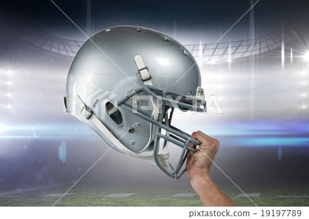 Composite image of close-up of american football player handing 19197789